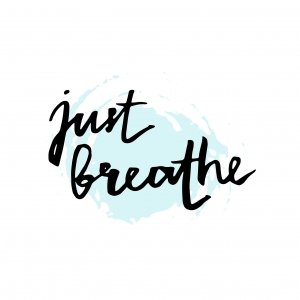Just breathe. Inspirational lettering quote.